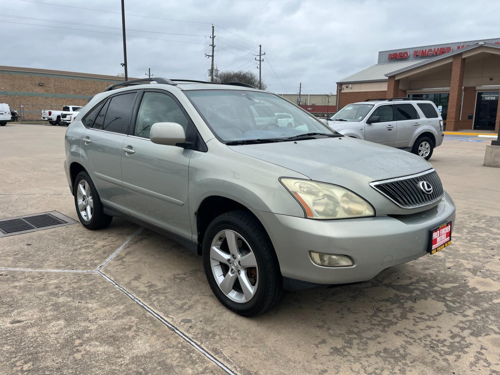 2004 SILVER /TAN Lexus RX 330 (JTJGA31U340) with an 3.3 engine, Automatic transmission, located at 14700 Tomball Parkway 249, Houston, TX, 77086, (281) 444-2200, 29.928619, -95.504074 - Photo #0